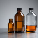 Amber glass laboratory bottles on a lab bench with soft directional light